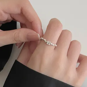Silver smiley face beaded open ring street style fashion finger jewelry detail shot