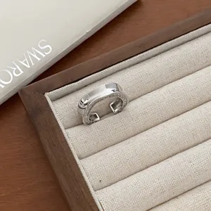 Silver geometric open ring, modern minimalist style metal finger ring for daily wear.
