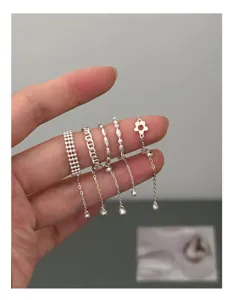 Minimalist stackable pull-chain silver rings set, versatile sweet-cool style jewelry for women.