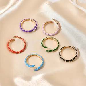 Close-up of colorful enameled bamboo joint open rings, featuring vibrant multi-color details.
