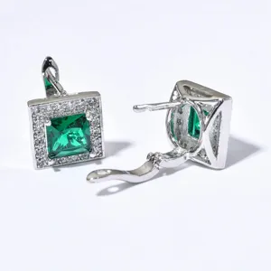 Detailed view of square green gemstone hoop earrings featuring sparkling micro-pave clear zircon accents.