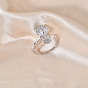 Detailed view of the elegant micro-pave lotus leaf ring, sparkling cubic zirconia.