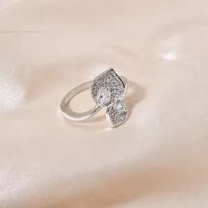 Elegant silver micro-pave cubic zirconia lotus leaf ring for women fashion jewelry detail.