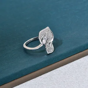 Detailed view of the stylish silver-plated micro-paved cubic zirconia leaf ring for women.