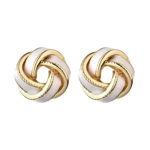 Elegant gold plated white enamel knot stud earrings for women, chic and versatile daily jewelry.