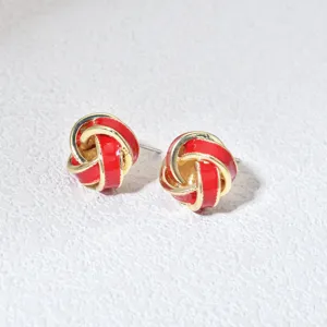 Exquisite red gold love knot stud earrings, elegant oil-drop design for chic daily wear.