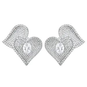 Stunning heart-shaped pavé zircon detail earrings, brilliant sparkling stone design.