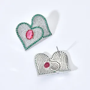 Exquisite heart-shaped earrings featuring sparkling white and green zircon with a bold red stone.