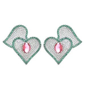 Fashion heart-shaped AAA zircon earrings with pink center stone and green border.