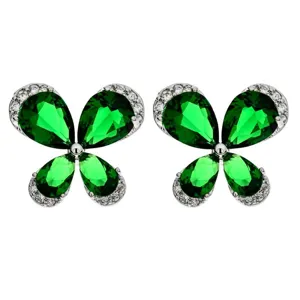 Close-up detail of green pear-shaped zircon clover butterfly earrings with silver pavé.