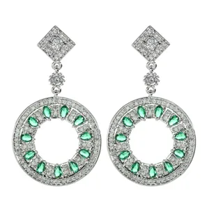 Elegant circular dangle earrings paved with sparkling white zirconia and green stones.