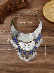 Vintage ethnic peacock bib necklace with blue rhinestone drops and multi-layer metallic fringe.