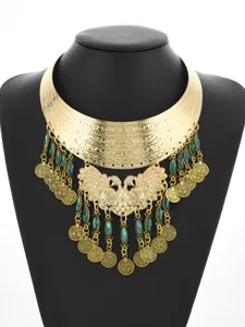 Detailed view of vintage ethnic peacock statement choker necklace with green rhinestone coins.