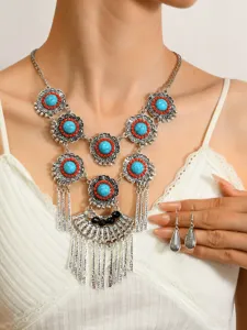 Bohemian vintage turquoise statement necklace and drop earrings set detail view.