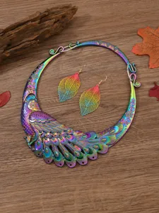 Detailed shot of retro peacock collar necklace and leaf earrings set, fashion ethnic style.