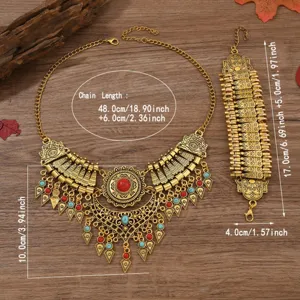 Böhmisches goldenes Statement Halskette und Armband Set mit roten und blauen Steinen.