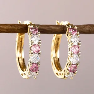 Elegant gold plated U-shaped hoop earrings featuring alternating pink and white zircons.