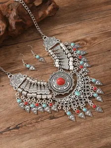 Vintage ethnic silver tone statement necklace earrings set with red and turquoise stones.