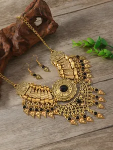 Vintage ethnic gold necklace and earrings set with black teardrop tassel for women style.