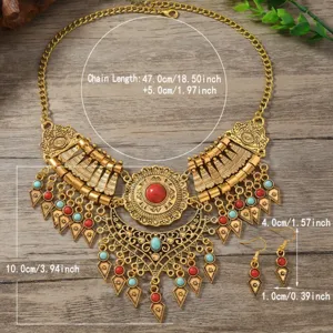 Vintage bohemian gold-tone statement necklace and earrings set with red turquoise stones.