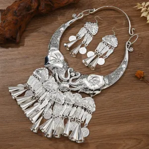 Superbe ensemble de collier et boucles d'oreilles torque éléphant style ethnique Miao femme.