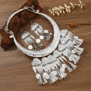 Ethnic Miao silver style choker necklace and earrings set, traditional carved tassel jewelry.