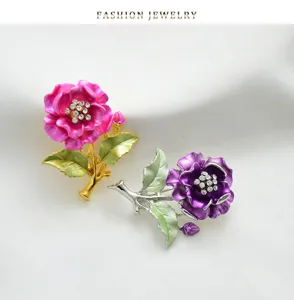 Elegant camellia flower brooch with rhinestones and alloy design for women fashion apparel.