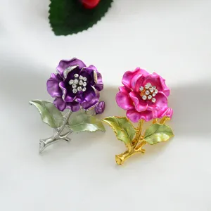 Beautiful alloy camellia flower brooch with sparkling rhinestones, elegant fashion jewelry.
