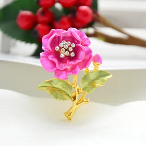 Stunning pink camellia flower brooch with crystal rhinestones, elegant alloy pin for women.