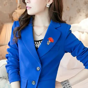 Exquisite red carnation brooch detail shot, stylish fashion lapel pin accessory for women outfits.