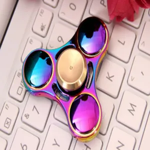 Colorful metal fidget spinner for stress relief, smooth spinning hand toy with rainbow finish.