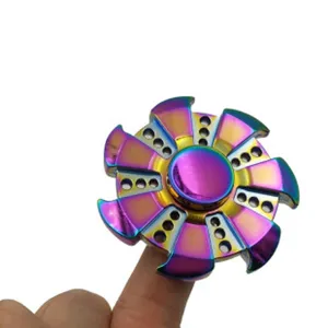 Detailed close-up view of the vibrant rainbow metallic fidget spinner toy showing surface finish.