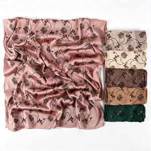 Floral satin scarf with draped design and multi-color rolled variants for women's fashion.