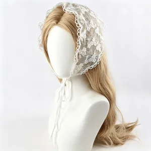 White lace floral embroidered headscarf bonnet with ties, elegant vintage hair accessory.