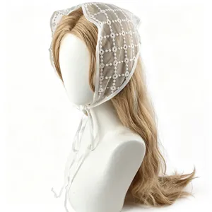 White lace triangle headscarf with delicate floral embroidery and ties for daily chic look.