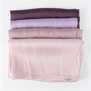 Detailed view of breathable crinkle satin long scarf, showing smooth fabric texture and soft color.