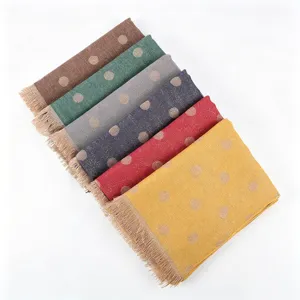 Detailed shot of multi-color women's rayon polka dot scarves with metallic jacquard.
