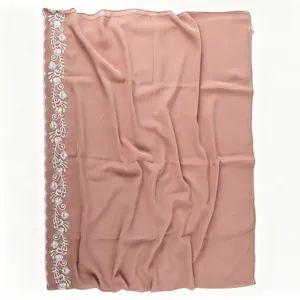 Detailed view of the pink chiffon long scarf featuring elegant white floral embroidered border.