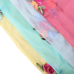 Detailed shot of multi-color embroidered mesh scarves for women, lightweight floral sheer shawls.