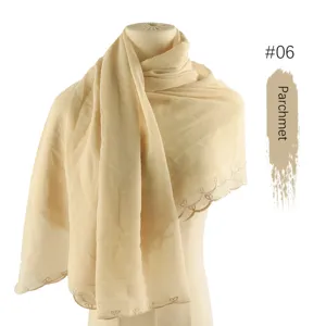 Beige chiffon embroidered scarf with delicate wave edges, elegant sheer shawl drape.