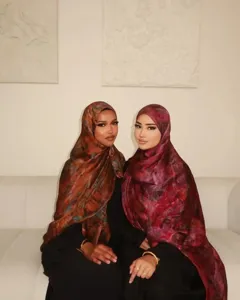 Elegant silk-feel marble print hijab scarf for women, ethnic style fashion shawl accessory.