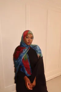 Fashionable tie-dye printed hijab and ethnic silk scarf for women, elegant daily wrap.