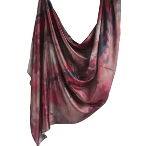 Silk-like marble print scarf detail, elegant draped textile texture for women's fashion wear.