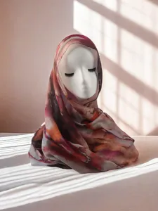 Close-up view of abstract printed modal ethnic women scarf featuring soft texture design.