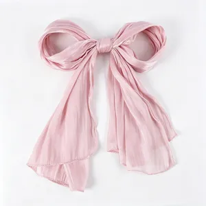 Pink satin bow headscarf, breathable long hijab crepe wrap for women stylish daily wear.