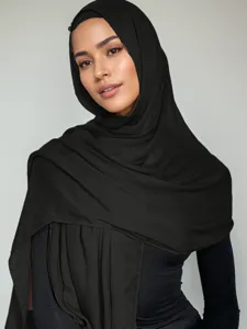 Detailed close-up view of the soft black breathable modal hijab showing fine fabric texture.
