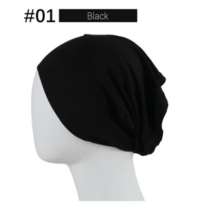 Detail view of the black modal stretch beanie cap, showing soft fabric texture and fit.