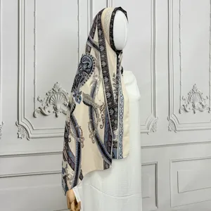 Detailed view of women chiffon paisley print ethnic shawl scarf for summer beach sun protection.