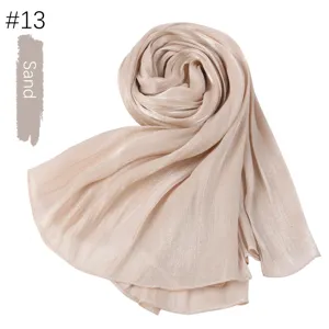 Solid color island silk pleated long scarf, lightweight breathable sand color variant.