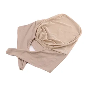Detail view of the breathable mesh cap, showcasing comfortable mercerized cotton fabric and ties.